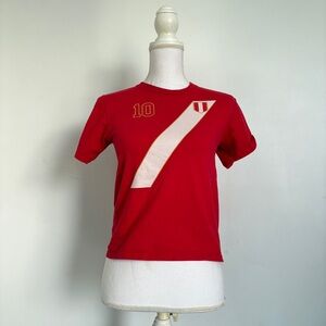Red jersey baby tee.